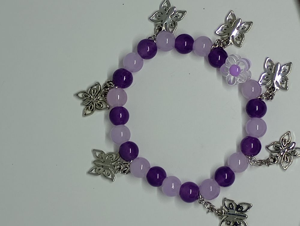 Flower and butterfly charms purple bracelet